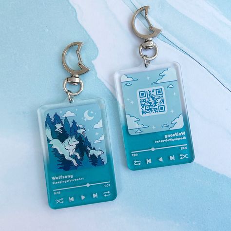 🎶 A wolf's midnight lullaby~🎶 Music player style acrylic charm keychains! Backside features a QR link to our music box theme, Wolfsong composed by Miyolophone, on SoundCloud! From our Whales & Wolves collaboration collection. You may find it's matching counterpart in Whalephat's shop. ✦ D e t a i l s ✦ * Size: ~2.5 (H) x 1.75 (W) inches * Material: Clear Acrylic * Double-sided charm * Silver plated Moon clasp accessory We'd love to see your purchase! You can support us by simply tagging us on Acrylic Keychains, Artist Alley, Charm Keychain, Music Player, Cute Keychain, Acrylic Charms, Music Players, New Pins, Whales