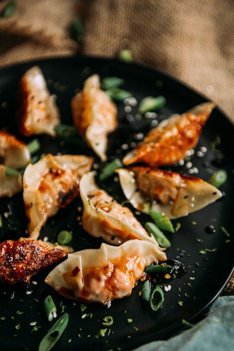 Homemade Salmon Dumplings - Girl Carnivore Garlic Ginger Chicken, Best Dumplings, How To Make Dumplings, Apple Slaw, Grilled Flank Steak, Ginger Chicken, Wonton Wrappers, Seasoned Rice, Super Bowl Party