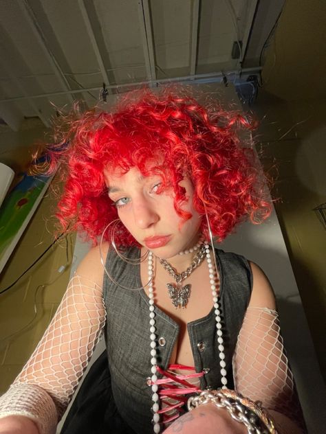 Red Dyed Curly Hair, Red Curly Hair Dyed, Short Curly Red Hairstyles, Short Curly Red Hair With Bangs, Red Alternative Hair, Bright Red Hair Curly, Red Orange Curly Hair, Bright Red Hair Dye, Bright Red Curly Hair