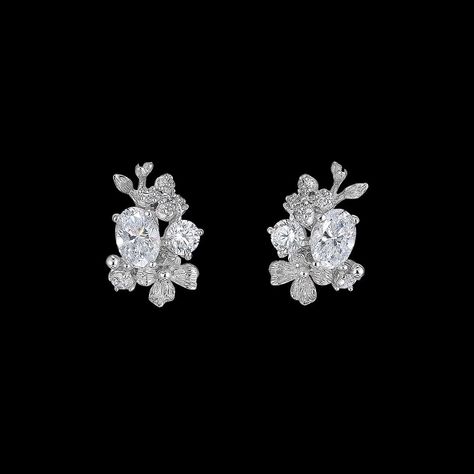 ENGLISH GARDEN COLLECTIONA beautiful and delicate pair of ear studs in 18k white gold and rhodium vermeil with 14k ear posts and butterfly backs, intricately hand-set with laboratory-grown simulated white diamonds of 2.8 carats in total weight.     Explore All Matching CreationsHand-crafted in the United Kingdom.#jewelrylover #handcraftedjewelry #jewelryinspiration #jewelrydesign #jewelryobsessed #jewelryoftheday #jewelrygoals #jewelryfashion #jewelrytrends Gold Diamond Studs, Diamond Jewelry Designs, Jewelry Fashion Trends, Classy Jewelry, Hanging Earrings, Girly Jewelry, English Garden, High Jewelry, White Diamonds