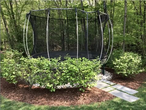 Trampoline In Backyard Ideas, Trampoline Landscaping Ideas, Landscaping Trampoline, Above Ground Trampoline Landscaping, Trampoline Anchor Ideas, Landscape Around Trampoline, Backyard Trampoline Landscape, Under Trampoline Landscaping, Trampoline In Garden