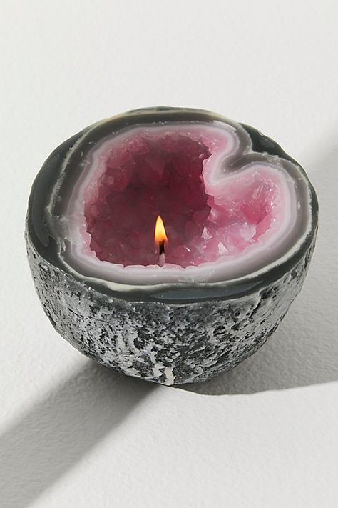 Bring some earthy beauty to your home with this stunning handmade wax candle, featured in a realistic crystal geode design that is sure to mesmerize. **Features:** 100% wax candle, clear wax core, rough " rock" bowl, crystal-like geode core design, all-cotton wick with 30+ hour burn time **Why We | Crystal Geode Candle by Amethyst & Amber Candles at Free People in Pink Amber Candles, Rock Bowl, Geode Candle, Earthy Beauty, Altar Design, Amber Candle, Spiritual Candles, Core Design, Creative Candles