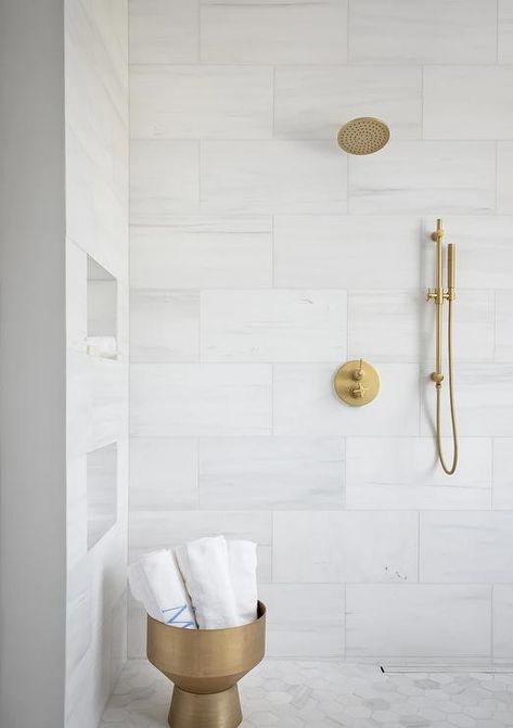 Transitional Bathroom Shower Ideas, Stacked Large Tile Shower Wall, Marble Look Bathroom Ideas, 12x24 White Tile Shower Walls, Big Tiles In Bathroom, Honed Tile Floor, Large Tile In Shower Stall, White Marble Bathroom Gold Fixtures, Chevron Marble Tile Bathroom