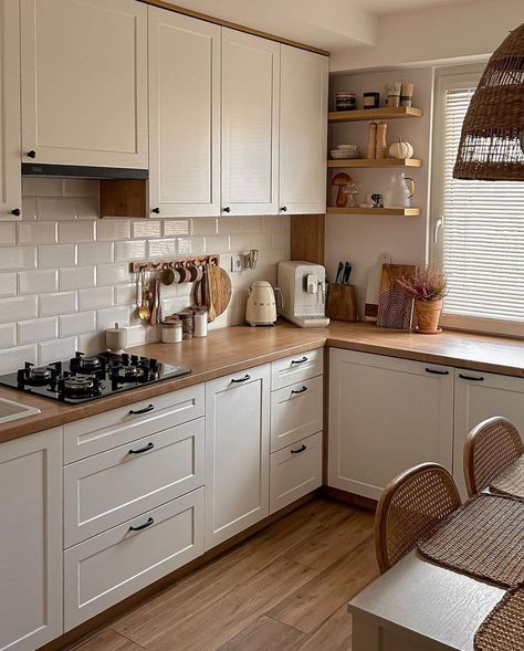 This kitchen has a white color scheme that is able to make the kitchen look bright and clean. Then, it is added with the brown wood color for a warm impression and not to make the decoration look boring. Bright Neutral Color Scheme from @mycozyhomely Reka Bentuk Dapur, تصميم للمنزل العصري, Small Kitchen Decor, 아파트 인테리어, Scandinavian Kitchen, Hus Inspiration, Kitchen Room Design, Kitchen Inspiration Design, Apartment Kitchen