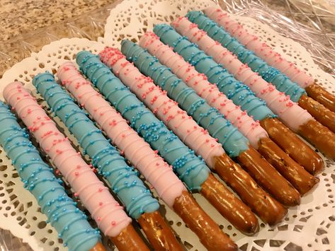 Gender Reveal Ideas Snack Table, Snack Table For Gender Reveal, Chocolate Covered Pretzel Rods Gender Reveal, Gender Reveal Casual Outfit, Rice Krispie Gender Reveal Treats, Pretzel Gender Reveal, Gender Reveal Pretzel Sticks, Gender Reveal Snack Table Ideas, Gender Reveal Dipped Strawberries