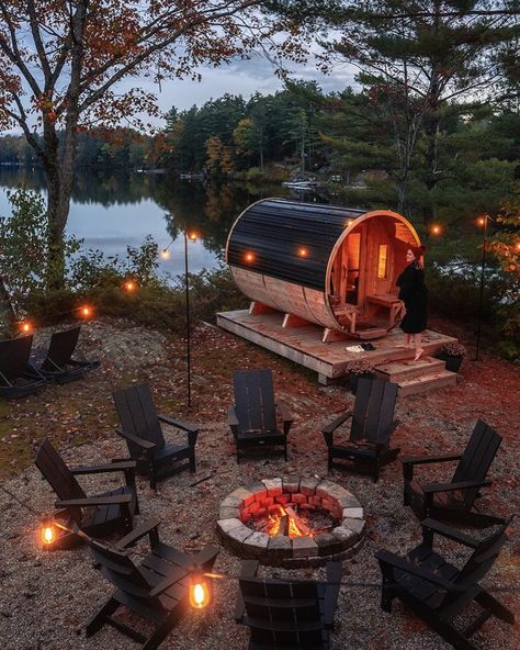 A cozy ambiance around your home sauna is a great way to create an inviting outdoor space. Hop in the sauna, gather around the fire and let the feeling of total relaxation take over! 📍 Loon Lake Retreat 📷 @thecabinhunter on Instagram #muskokacottage #discovermuskoka #muskokalife #saunalife #saunasession #relax Sauna Outdoor Backyards, Wood Fire Sauna, Mini Sauna Outdoor, Outdoor Retreat Ideas, Sauna And Cold Plunge Outdoor, Sauna In Garden, Sauna Ideas Outdoor, Barrel Sauna Landscaping, Outdoor Spa Ideas