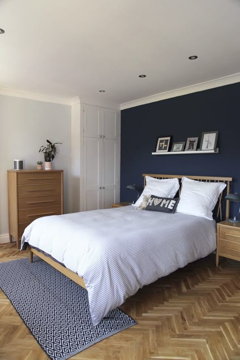 Ercol furniture bedroom with parquet floor Blue Feature Wall Bedroom, Minimal Bedrooms, Bedroom Wood Floor, Dark Blue Rooms, Beautiful Bedroom Colors, Blue Bedroom Walls, Ercol Furniture, Feature Wall Bedroom, Parquet Floor