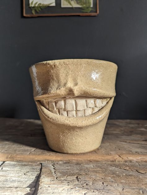 Hand crafted stoneware planter with a sculpted mouth finished with a clear gloss glaze  (18cm height) (13cm width) Subscribe for indoors or outdoors Clay Mouth, Sculpted Face, Plants Home Decor, House Planter, Plants Home, Clay Sculptures, Handmade Planter, Ceramics Ideas, Clear Gloss