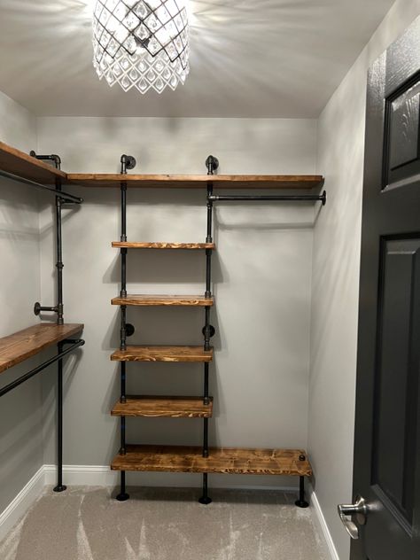 Customizable closets shipped and delivered to your door. Home & office Farmhouse Style Closet, Farmhouse Closet Organization, Open Room Closet Ideas, Small Hunting Closet Ideas, Wrought Iron Closet Ideas, Pipe Shelf Closet, Black Iron Closet Ideas, Industrial Style Walk In Closet, Cabin Closet Ideas