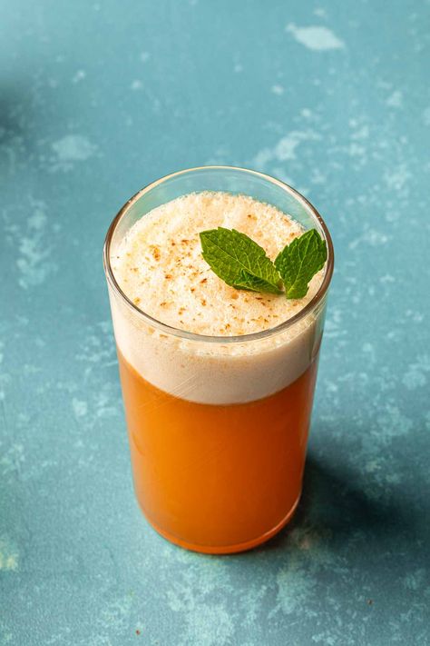 This carrot bourbon cocktail is unique and perfect for celebrating Easter! Made with fresh carrot juice and smooth whiskey bourbon, this cocktail is given a touch of complexity with a splash of amaro and balanced out with tart lemon juice. Carrot Cake Cocktail, Carrot Juice Cocktail, Carrot Cocktail, Vegetable Cocktails, Carrot Souffle, Easter Drink, Blackberry Margarita, Bourbon Cocktail Recipe, Easter Cocktails