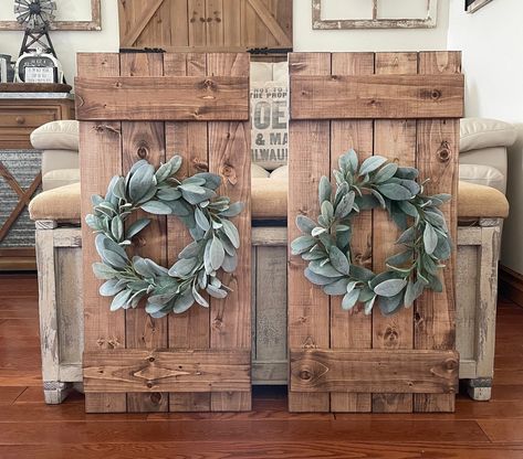 Add a touch of rustic farmhouse charm to your home with this Wood Shutter Wall Decor including a Lambs Ear Wreath. Measuring 14" x 30", this unique piece is perfect for adding a pop of greenery and texture to any space. Each shutter is handcrafted and no two are exactly alike, making it a truly one-of-a-kind addition to your decor. Whether you're looking to create a beach house vibe or simply want to add a touch of farmhouse style, this wall decor is sure to impress.  Hanging hardware is include Diy Farmhouse Window Frame, Wreaths For Bedroom Wall Decor, Shutter Ideas For Inside, Bedroom Wall Decor Rustic, Diy Shutters Indoor Wall Decor, White Shutters Living Room, Window Shutters Decor, Farmhouse Shutters Decor, Window Shutter Crafts