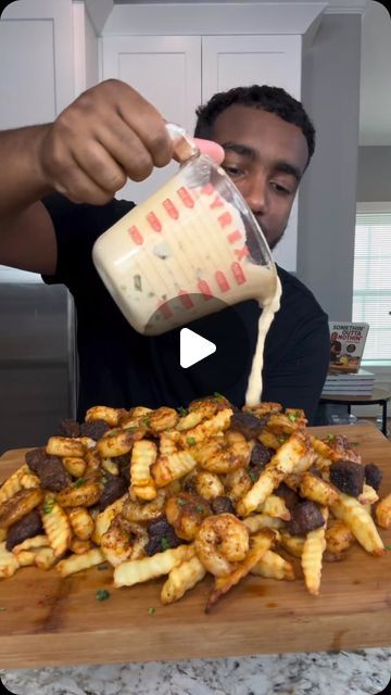 🧬Helping You Unlock the Best Version of Yourself on Instagram: "Loaded Surf & Turf Fries! 🍤🥩 
.
. credit goes to ⤵️
🎥 : @eatwitzo 
.
.

I was thinking of new appetizers I wanted to try and this is now my new favorite! Make it immediately 😂

Full ingredient list: 

1-2 lb steak cubed (ny strip or sirloin) 
1 lb large shrimp 
1-2 tsp chili powder
1-2 tsp dried oregano 
1-2 tsp onion powder 
1-2 tsp black pepper
1-2 tsp salt (optional) 
*Use separate seasoning amount for steak & shrimp* 
For fries: 
6-8 large russet potatoes peeled 
Large ice water bath 
Directions- 
1. Cut fries and add to water bath to soak for At least 30 minutes (to remove all starch) 
2. Pat fries dry and bring oil to 300 F and fry for 5-6 minutes until fully cooked. 
3. Set aside and bring oil to 375 F. Fry for ano Loaded Steak Fries Recipes, Steak Loaded Fries, Loaded Steak Fries, Fries With Steak, Surf And Turf Recipes, Surf N Turf Recipes, New Appetizers, Steak And Fries, Steak Shrimp