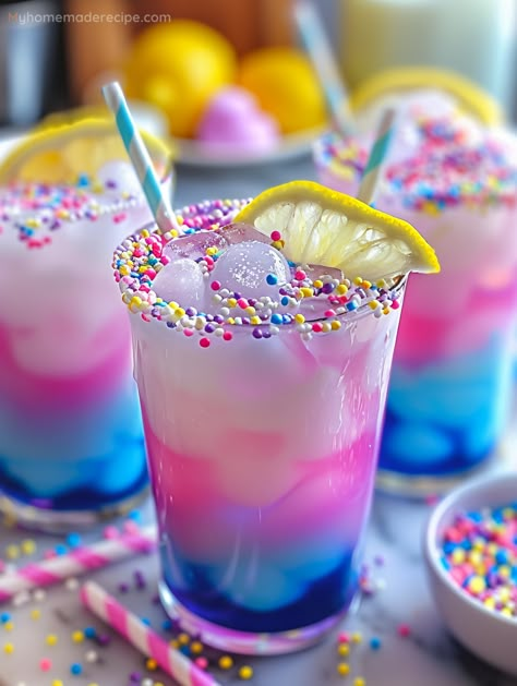 Sip The Magic: Enchanted Unicorn Lemonade Recipe - My Home Made Recipe Homemade Unicorn Lemonade, Unicorn Mocktail Drinks, Unicorn Birthday Party Drinks, Unicorn Juice Birthday Parties, Unicorn Lemonade For Kids, Galaxy Drinks For Kids, Easter Kids Drink, Encanto Drink Ideas, Unicorn Lemonade Recipe