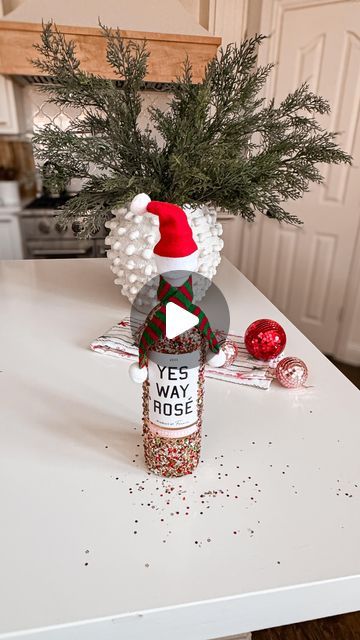 bren | home, holidays & lifestyle | Dallas tx on Instagram: "Christmas Hostess Gift Idea 🎄🎅

Spread some holiday cheer with this simple and festive gift idea! 🎁✨ comment “GIFT” below to receive a DM with the link to shop this post  https://liketk.it/4Z7S9 

I transformed a wine bottle using mod podge and a custom glitter mix I created in classic Christmas colors, then added a mini Santa hat and scarf to tie it all together. It’s perfect as a hostess gift, a fun surprise for wine lovers, or even as part of a holiday party setup! 🥂🎄

Be sure to SAVE this for inspiration and SHARE with your Christmas-loving bestie! 🍷🎅

#christmas #christmasgifts #holidaydiy #holidayideas #hostessgifts #christmasinspo #holidayinspiration #diyholiday #holidaycheer #christmasparty #easydiy #christmasgifti Mini Santa Hat, Bestie Christmas, Yes Way Rose, Christmas Hostess Gifts, Christmas Hostess, Party Setup, Instagram Christmas, Christmas Inspo, Custom Glitter