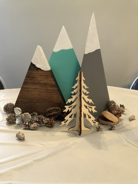 Adventure Awaits painted wood mountain centerpieces Adventure Theme Centerpieces, Mountain Theme Party Decorations, Mountain Centerpieces Table Decorations, Mountain Party Decorations, Mountain Theme Retirement Party, Let The Adventure Begin Centerpieces, Mountain Theme Centerpieces, Hiking Centerpieces, An Adventure Awaits Baby