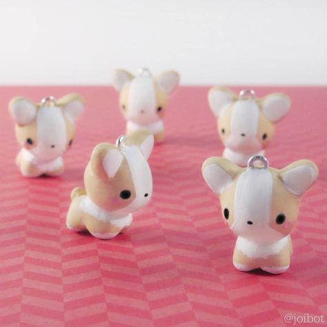 Corgi Puppy Charms!  These are the first charms I've hand painted the features on, and it was a lot harder then I expected.  They didn't come out exactly like I wanted.. But they're good enough  #corgi #puppy #puppies #dog #polymerclay #polymerclaycharms #polymerclaycreations #kawaii #chibi #nerdy #cute #handmade #crafty #etsy #premo #sculpey #fimo Polymer Clay Dog, Clay Dog, Cute Polymer Clay, Corgi Puppy, Kawaii Chibi, Cute Clay, Dog Blog, Easy Diy Art, Polymer Clay Charms