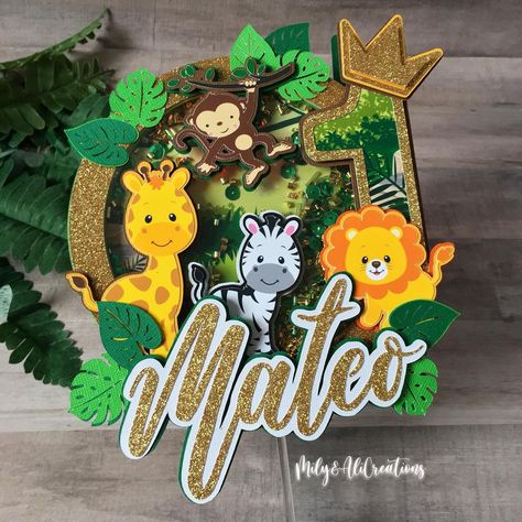 Mily&AliCreations on Instagram: “Wild One Safari Cake topper shaker with light 🌴🦁🦓🦒🌴, for the handsome baby Mateo 👑 💙💚💙💚!! (Swipe for more pictures) (DM FOR ORDER)…” Wild One Safari Cake, Safari Cake Topper, Madagascar Cake, Topper Safari, Safari Cake, Wild Birthday Party, 3d Cake Toppers, Handmade Cake Topper, Safari Cakes