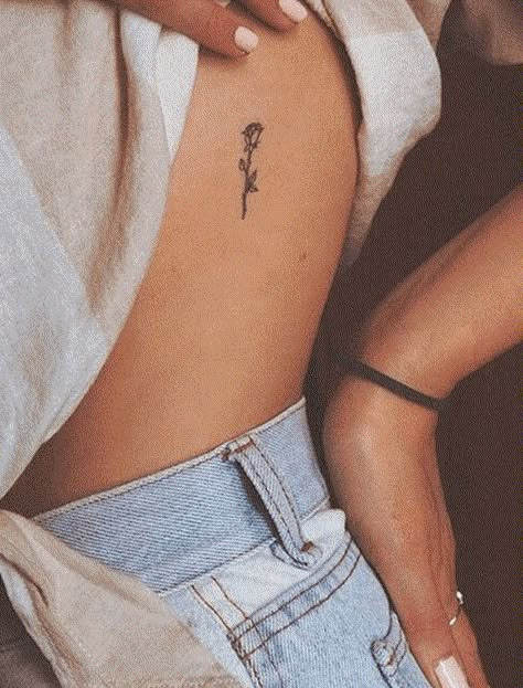 10 Simple Yet Beautiful Tattoo Designs - Society19 UK Rose Rib Tattoos, Wörter Tattoos, Meaningful Tattoos For Women, Small Flower Tattoos, Small Girl Tattoos, Inspiration Tattoos, Cute Small Tattoos, Discreet Tattoos, Dainty Tattoos