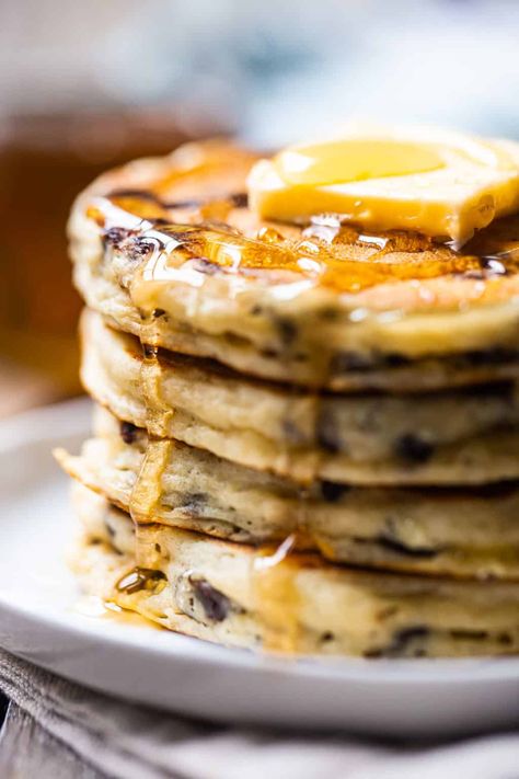 Chocolate Chip Pancakes: My kids love when I make these! They rise up sky-high and there's gooey melted chocolate in every bite. #chocolatechippancakes #pancakes #recipe #recipeeasy #chocolatechip #buttermilk #fluffy #fromscratch #homemade #recipehomemade #souffle #easy #chocolate #howtomake #mini #birthday #bakingamoment Pancakes Simple, Chocolate Chip Pancakes Recipe, Easy Homemade Granola, How To Cook Pancakes, Chocolate Glazed Donuts, Baked Pancakes, Chewy Granola, Chocolate Chip Pancakes, Pancakes Ingredients