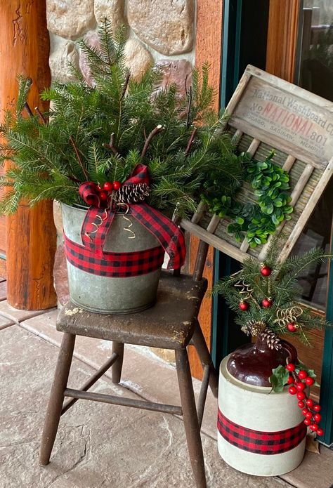 We up-cycle galvanized items!  Buckets, funnels, etc. Coal Bucket Christmas Decor, Christmas Tree In Wagon, Fall Porch Pot Ideas, Galvanized Pail Ideas, Wash Tub Christmas Decor, Galvanized Bucket Christmas Decor, Old Milk Can Ideas Front Porches, Christmas Container Ideas, Christmas Bucket Decor