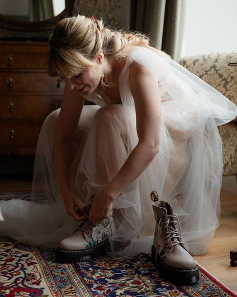 The best bridal prep photos involve custom Doc Martens… Yep I’m biased, but LOOK AT HOW GORGEOUS THESE PHOTOS ARE 😱. 📷 @themcyoungs 💐 @breaghabloomsgla . . #wedding #bridalprep #docmartens #drmartens @drmartensofficial @rockmywedding #weddinginspiration #ukwedding Wedding Dress And Dr Martens, Wedding Dress Doc Martens, Doc Martens Wedding Dress, Wedding Docs, Wedding Doc Martens, Custom Doc Martens, Bridal Prep Photos, Bespoke Jacket, Soft Goth