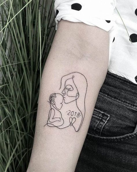 31 Mother-Son Tattoos To Honor The Unbreakable Bond - Our Mindful Life Mother And Son Tattoo Design, Mother And Son Tattoo, Tattoo For My Son, Mutterschaft Tattoos, Mother And Baby Tattoo, Tattoos For Baby Boy, Motherhood Tattoos, Small Wave Tattoo, Mother Son Tattoos