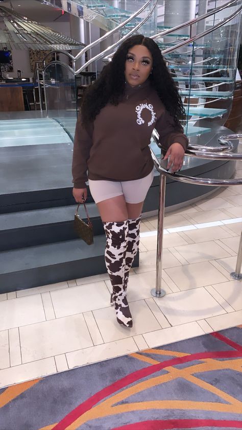 Cowboy Boots And Shorts Outfit Black Women, Leopard Thigh High Boots Outfit, Shorts With Long Boots, Hoodie And Heels Outfits, Boots And Shorts Outfit Black Women, Biker Shorts And Boots, Print Boots Outfit, Boots With Shorts, Birthday Baddie