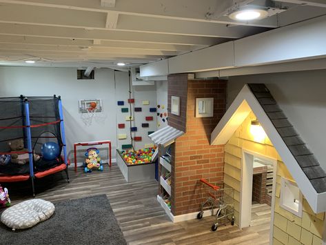 We got a ball pit, rock climbing wall, play house with kitchen, art area, books, trampoline, slide and much more Trampoline In Playroom, Playroom With Trampoline, Basement Playhouse With Slide, Basement Trampoline, Indoor Trampoline Playroom, Playroom Slide, Kids Indoor Play Area, Basement Play Area, Garage Workout