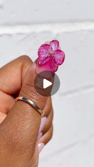 Necta on Instagram: "First attempt at 3D orchid nail art, how did I do?🙆🏽‍♀️🌺💖🙇🏽‍♀️  - Solid glue gel (clear) - Iridescent chrome powder - Pink pigment powder - Gold caviar beads   #nailartist #orchid #orchidnails #flowernails #nailsinspiration #gelx #rubberbasegel #auranails #nailswag #nailsnailsnails #nailsdone #nailzmagazine #nailsofinstagram #reelsinstagram #viralreels #fyp #viralvideos #instagram #nectanails #tutorial #nailporn #gelpolish" Orchid Nails Almond, 3d Clear Gel Nail Art, Pigment Powder Nails, 3d Orchid Nails, Aura Nails 3d Flower, Orquideas Nails, Orchids Nails Art, Clear Gel Nails, Orchid Nails