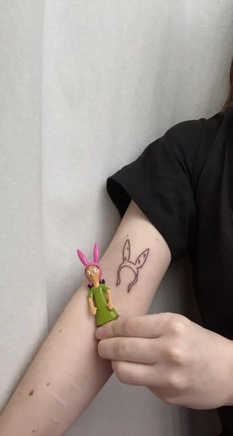 Simple Bobs Burgers Tattoo, Bobs Burgers Tattoo Louise, Bobs Burgers Tattoo Ideas, Louise Belcher Tattoo, Bobs Burgers Tattoo, Tattoo Portfolio, Bob's Burgers, Bobs Burgers, Tattoo Inspo