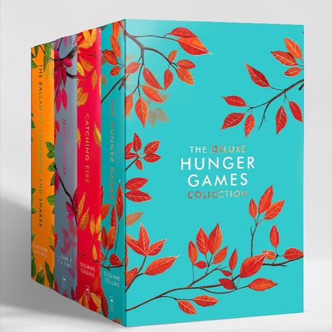 The new Deluxe Hunger Games 4 book Collection Hardcover box set featuring new cover art for The Hunger Games, Catching Fire, Mockingjay, and The Ballad of Songbirds and Snakes. The art features different solid color backgrounds for each book, with new black mockingjay art for each book and different colored leaves. The mockingjays are in the style of the original novels but black instead of gold. The Hunger Games is aqua blue, Catching Fire is red, Mockingjay is lavender, Ballad is gold. Hunger Games Book Cover, Hunger Games Book, New Hunger Games, The Hunger Games Books, The Hunger Games Book, Hunger Games Books, Hunger Games Series, Hunger Games Catching Fire, Hunger Games Trilogy