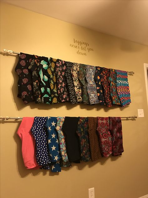 My LulaRoe Leggings Wall! Pretty and accessible way to store my rapidly growing collection. How To Display Leggings In A Boutique, Legging Display Ideas, Legging Display Boutique, Best Way To Store Leggings, Leggings Storage Ideas, Store Leggings Ideas, Storing Leggings Ideas, How To Store Leggings In Closet, Legging Storage