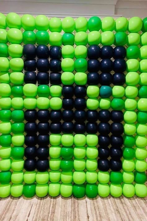 Now, this is one party decoration that will blow everyone away. Create a Creeper balloon wall with a bunch of green and black balloons. Place them behind your dessert table or as a photo booth backdrop. Whichever way you choose to use it you can never really go wrong! See more party ideas and share yours at CatchMyParty.com Birthday Minecraft Ideas, Minecraft Zombie Birthday Party, Videogame Birthday Party, Minecraft Birthday Party Backdrop, Minecraft Decoration Ideas For Birthday, Minecraft Games For Birthday Parties, Minecraft Birthday Ideas, Minecraft Balloons, Minecraft Birthday Decorations