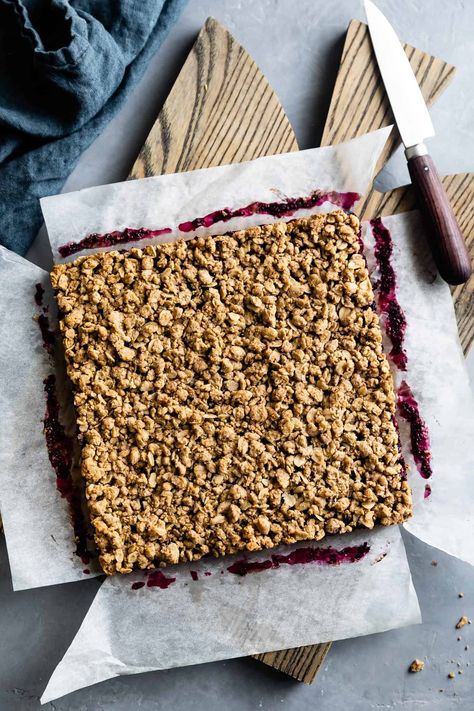 Healthy breakfast oatmeal jam bars filled with homemade berry chia jam or your favorite store-bought jam. Sweetened with only a hint of coconut sugar and maple syrup. These cozy berry crumble bars are made with whole grain oat flour, mildly sweet sorghum flour, and rolled oats! #oatbars #oatmealjambars #oatmeal #chiajam #berries #berryjam #recipe #breakfast #healthy #gluten-free #oats #sorghumflour Oatmeal Jam Bars, Healthy Breakfast Oatmeal, Berry Crumble Bars, Oatmeal Bars Healthy, Oat Flour Recipes, Jam Bars, Bars Healthy, Healthy Oatmeal Breakfast, Baking Power