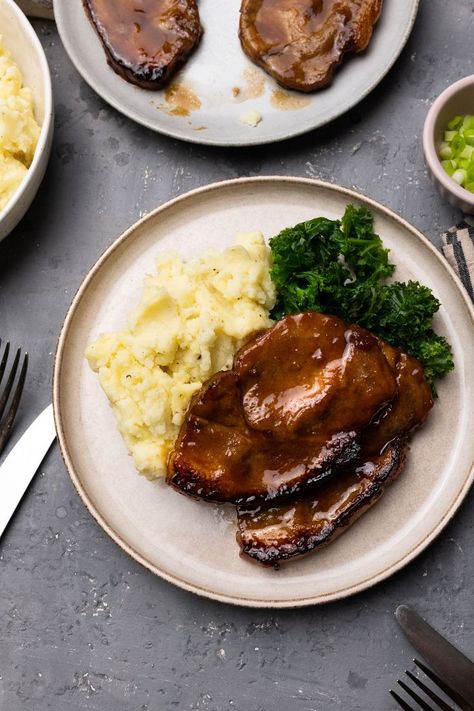 Quick and simple to throw together, easy to cook, and absolutely packed full of flavor, this recipe is a surefire winner for a midweek meal option, or it can be dressed up to make a wonderful dinner party dish. These pork steaks are marinated in a delicious mixture of hoisin sauce, soy sauce, honey, and spices, before being grilled to perfection, resulting in sticky and juicy Asian-style pork. #sticky #hoisin #stickyhoisin #pork #hoisinpork #steak #porksteak Honey Steak, Hoisin Pork, Pork Steak Recipe, Pork Steaks, Pork Marinade, Dinner Party Dishes, Honey Pork, Marinate Meat, Pork Steak