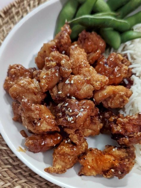 Panda Express Orange Chicken Copycat – Our tangy Panda Express orange chicken copycat is a recipe you’ll come back to again and again! Sticky and sweet, this chicken is BETTER-THAN-TAKEOUT. … The post Panda Express Orange Chicken Copycat appeared first on Jamil Ghar. Chinese Eggplant Recipes, Ways To Cook Eggplant, Panda Express Orange Chicken, Sesame Tofu, Sour Soup, Panda Express, Orange Sauce, Crispy Pork, Red Chili Flakes