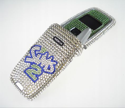 sims 2 bedazzled rhinestone nokia flip phone Flip Phone Rhinestones, Bedazzled Flip Phone Y2k, Bedazzled Flip Phone, Nokia Flip Phone, Cow Print Cowboy Hat, Y2k Tech, Y2k Phone Case, Ophelia Dress, Armani Hotel