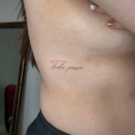 Handwritten tattoo that says "todo pasa", done on the Tattoos In Spanish For Women, Spanish Script Tattoo, Spanish Tattoo Ideas, Spanish Quote Tattoos For Women, Spanish Quotes For Tattoos, Rib Tattoos For Women Quotes, Small Spanish Tattoos, Handwritten Tattoo, Spanish Quotes Tattoos