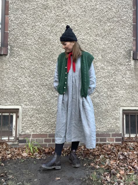 Layered Outfit Spring, Fall Outfits 2023 Colorful, Layered Linen Outfits, Layers Outfits Spring, Linen Dress Winter Outfit, Vest Over Dress Outfit, Gnomecore Outfit, Vest And Dress Outfit, Green And Red Outfit