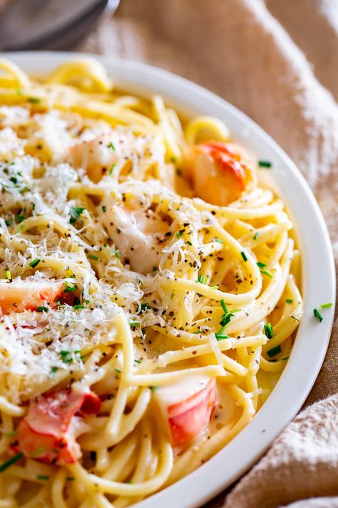 This Creamy Lobster Pasta combines the elegance of lobster, the comfort of creamy sauce, and the zing of garlic, herbs, and lemon; all stirred through a tangle of perfectly cooked spaghetti. Lobster has this way of making any meal feel special. And when you add a creamy sauce, you're practically in food heaven. This isn't just a recipe; it's an invitation to create a memorable date night with a restaurant-quality dish. But here's the secret: it's quick, it's easy, and it's guaranteed to ... Spaghetti Lobster, Invitation To Create, Lobster Pasta, Lobster Dishes, Date Night Dinner, Elegant Restaurants, Date Night Dinners, Food Heaven, Recipes From Heaven