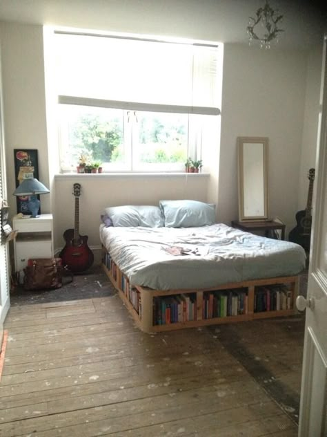 Bed Frame With Book Storage, Floor Bed With Bookshelf, Low To The Floor Bed Frame, Raised Beds For Small Rooms, Under Bed Bookshelf, Bed With Bookshelves Underneath, Book Bed Frame, Bookshelves Bed Frame, Books Under Bed