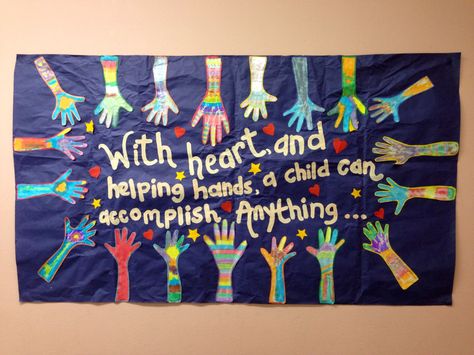 With heart && helping hands, a child can accomplish anything Posters On Helping Others, Hand Bulletin Board Ideas, Compassion Bulletin Board, Hands Bulletin Board Ideas, Helping Hands Bulletin Board Ideas, Cold Hands Warm Heart Bulletin Board, Inclusion Door Decoration, Classroom Handprint Poster, Collaborative Art Projects For Kids