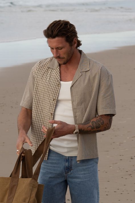 Embrace coastal vibes with our Cross Check Relaxed SS Shirt in Natural Mixed Check. This relaxed-fit shirt features a checked patch print throughout, complemented by tonal buttons and Rhythm trims. Perfect for effortless style and comfort wherever your adventures take you.
----
Material
100% Cotton
----
Features
Relaxed fit
----
Size & Fit
Model wears a size M. His measurements are as follows:
Height: 187CM
Chest: 91 CM
Waist: 76 CM Outfit Inspiration For Men, Mens Woven Shirts, Varsity Jacket Outfit, Mens Inspo, Guys Fashion Casual, Desert Chic, Models Off Duty Style, Cowboy Aesthetic, Mens Summer Outfits