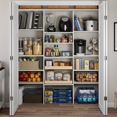 Revamp your kitchen storage with this reach-in pantry organization system, designed to bring both convenience and style to your space. Crafted from scratch-resistant engineered wood, this system offers long-lasting functionality and easy maintenance. It includes tray dividers, two maple drawers, and adjustable shelves that can be cut to fit your pantry dimensions, ensuring a personalized and clutter-free storage solution. Plus, it measures a little over 78" tall and 74" wide, so it's sure to giv Closet To Pantry Convert, Realistic Pantry Organization, Shallow Pantry Ideas, Wall Pantry Cabinets, Large Pantry Organization, Closet Pantry Organization, Closet Pantry Ideas, Reach In Pantry, Pantry Closet Shelving Ideas