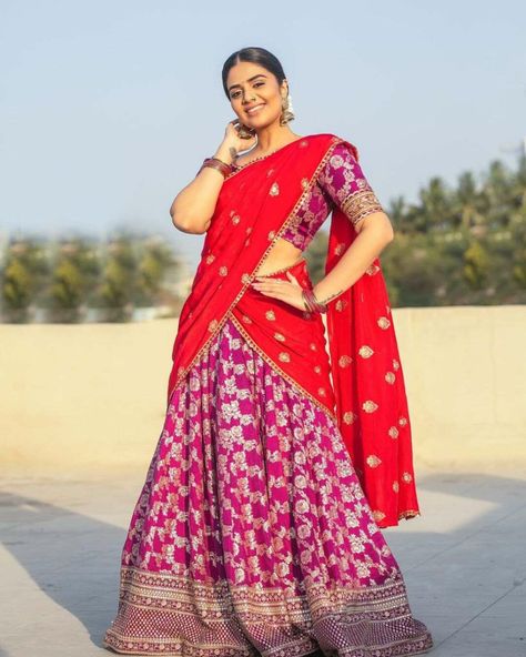 Sreemukhi in a magenta half saree by label vishwa for ugadi event Indian Royalty, Colorful Bangles, Royalty Aesthetic, Latest Designer Sarees, Half Saree Designs, Best Online Casino, Money Fast, Half Saree, Saree Blouse Designs