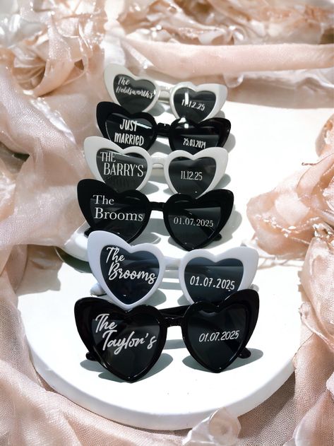 Personalised wedding & birthday sunglasses .  https://savannaivyco.etsy.com/listing/1670210274 FOR FLOWER GIRL AND PAGE BOY GLASSES CLICK ON LINK BELOW. https://savannaivyco.etsy.com/listing/1589308682 please check estimated deliverery times before purchasing , I cannot guarantee delivery times as once it's with the courier it's out of my control , please also have a look at my current processing time before ordering , any questions please ask  .  1st class postage available at checkout wedding Wedding Sunglasses For Guests, Groom Sunglasses, Birthday Sunglasses, Engraved Champagne Flutes, Bride Sunglasses, Wedding Tissues, Wedding Sunglasses, Tie The Knot Wedding, Flower Girl Jewelry