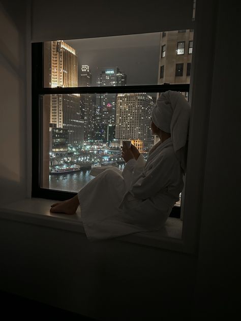 Woman sitting on windowsill looking at city with a cup of tea City View Aesthetic, Cityscape Aesthetic, Aesthetic Luxury Lifestyle, Chicago Living, Chicago Aesthetic, View Aesthetic, Chicago Winter, Chi Town, Aesthetic Luxury