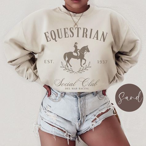 Experience sophistication and companionship in our Equestrian Social Club Sweatshirt. Designed for those with a taste for luxury, this sweatshirt seamlessly combines comfort with elegance. Embrace both coziness and fashion as you proudly display your love for horses, one of the most beautiful creatures in this world. Note: The font colors will match the pictured shirt colors. (See images for matching font colors) If you do not add your personalization, the year and location from the template des Gifts For Equestrians, Horse Lover Gifts, Horse Clothes, Horse Sweater, Match Font, Horse Sweatshirts, Horse Things, Custom Horse, Horse Owner