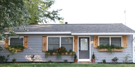 Gray house wood shutters Exterior Shutters On Brick, Shutters And Window Boxes, Cedar Window Boxes, Wood Shutters Exterior, Brick Ideas, Window Boxes Diy, Cedar Shutters, Gray House, Grey House