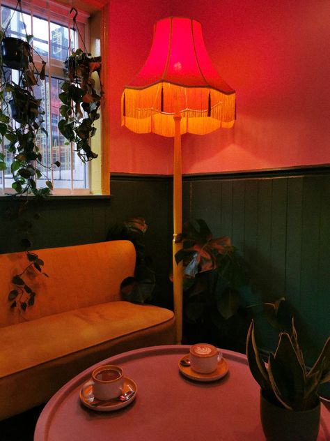 This vintage victorian style lampshade is made with pink fabric paired with yellow fringe and gimp braid with pink tassels. It works so well to bring colour to a room, suiting this colourful yellow, pink and green interior in this cafe. Both the stand and shade are available together! Fringe Lampshade Vintage, Pink Yellow Orange Aesthetic Room, Fringe Floor Lamp, Tassel Lamps, Pink And Green Interior, Fringe Lamps, Fringed Lampshade, Tassel Lampshade, Tassel Lamp